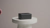 Looping hero video showing the Fox Fold Facial Tissue Dispenser and the Fox Fold Toilet Paper Dispenser being refilled.